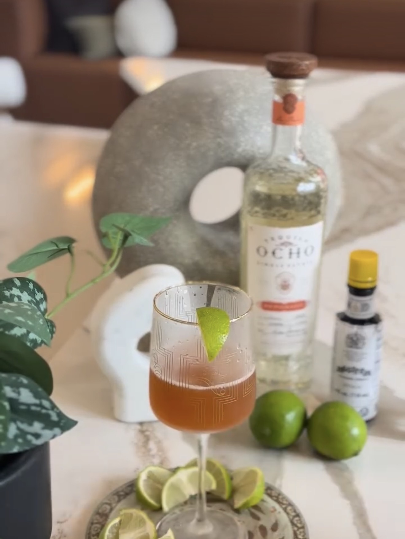 Maison Miel cocktail with lime garnish